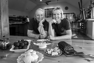 MaryAnna O’Donnell and Jeanne Daley show off some of the baked goods they sell at Saratoga Gluten Free Goods, their year-old bakery and cafe in Schuylerville. Joan K. Lentini photo