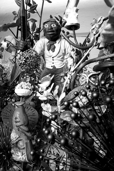 A detail from “Until,” Nick Cave’s upcoming installation at Mass MoCA, reveals an elaborate landscape built from kitschy items the artist collects on secondhand shopping sprees -- items that sometimes raise troubling themes related to race. Douglas Mason photo/courtesy Mass MoCA
