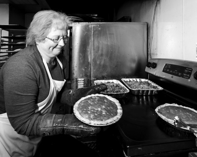 Shelley Smith says she learned the finer points of pie making from her husband’s grandmother. The family orchard’s bake shop now regularly produces nearly two dozen pie varieties. Joan K. Lentini photo