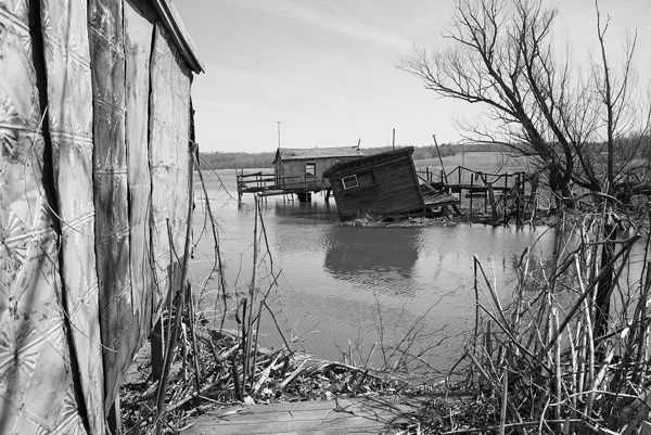 A real-life controversy over a cluster of old fishing shanties along the Hudson River in Hudson, N.Y., has become the basis for a local author’s new novel. Susan Sabino photo