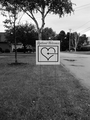 

Lawn signs promote the new civic group Rutland Welcomes, which supports the planned resettlement of 100 Syrian refugees in the city. C.B. Hall photo