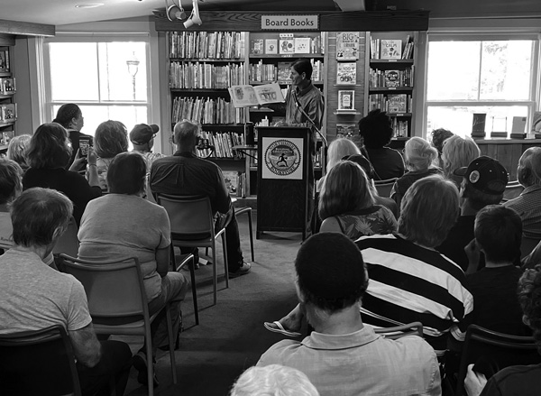 Vermont Lt. Gov. David Zuckerman reads to an audience at Northshire Bookstore in Manchester, one of a series of stops he made around the state in recent months as part of his Banned Book Tour. Courtesy photo