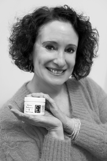 Mary Kuntz holds a jar of her handcrafted, small batch Divine Radiance face cream. Joan K. Lentini photo