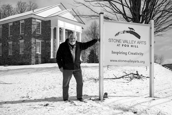 Local author David Mook stands in front of the Stone Valley Arts building, the site of a community “favorite poem” reading April 21 in Poultney, Vt. A companion event, Poultney Poetry Downtown, will display poems in the windows of local businesses in celebration of National Poetry Month.Joan K. Lentini photo