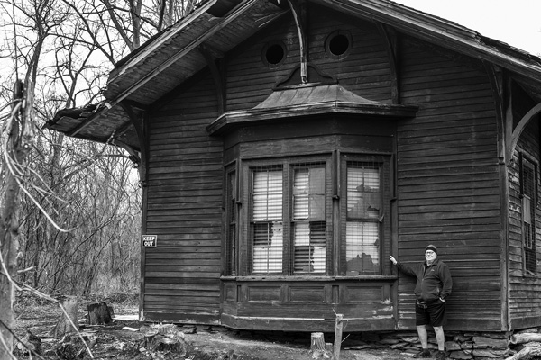 Joe Ogilvie, president of the Corkscrew Rail Trail Association, stands outside the bay window of the former Rutland Railroad station in New Lebanon, N.Y., where the last train rolled past 70 years ago.Joan K. Lentini photo