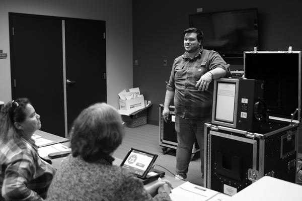 Harold Hubbard, the Republican deputy elections commissioner for Warren County, demonstrates the use of new voting machines at a late January training session for elections inspectors. Joan K. Lentini photo