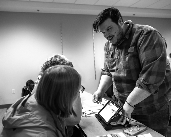 Harold Hubbard, the Republican deputy elections commissioner of Warren County, instructs elections inspectors at a recent training session on the use of electronic poll books. The devices ensure that voters who cast ballots at New York’s early voting sites cannot vote more than once. Photo by Joan K. Lentini
Harold Hubbard, the Republican deputy elections commissioner of Warren County, instructs elections inspectors at a recent training session on the use of electronic poll books. The devices ensure that voters who cast ballots at New York’s early voting sites cannot vote more than once. Photo by Joan K. Lentini