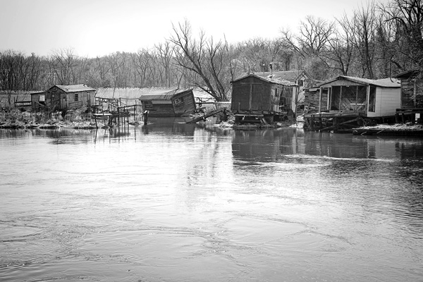 A collection of more than a dozen old fishing shanties along the Hudson River, some of which are seen here in 2018, has been deemed historically significant by state officials. But the city of Hudson says it lacks the resources needed to preserve them as part of a pending waterfront redevelopment project. Susan Sabino file photo